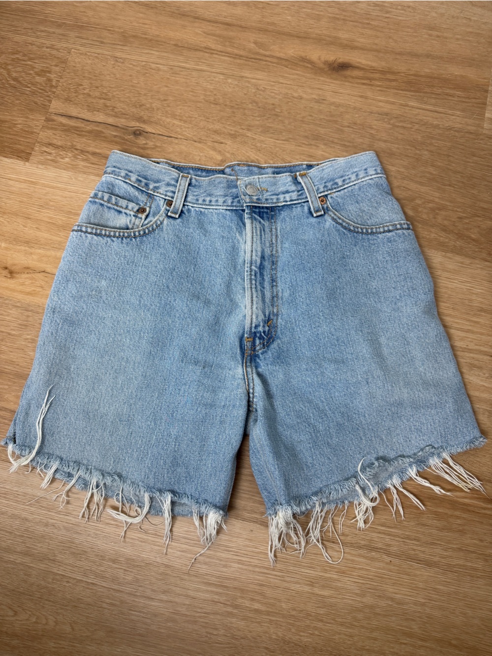 Vintage Levi’s Frayed Hem Light Blue Denim Shorts